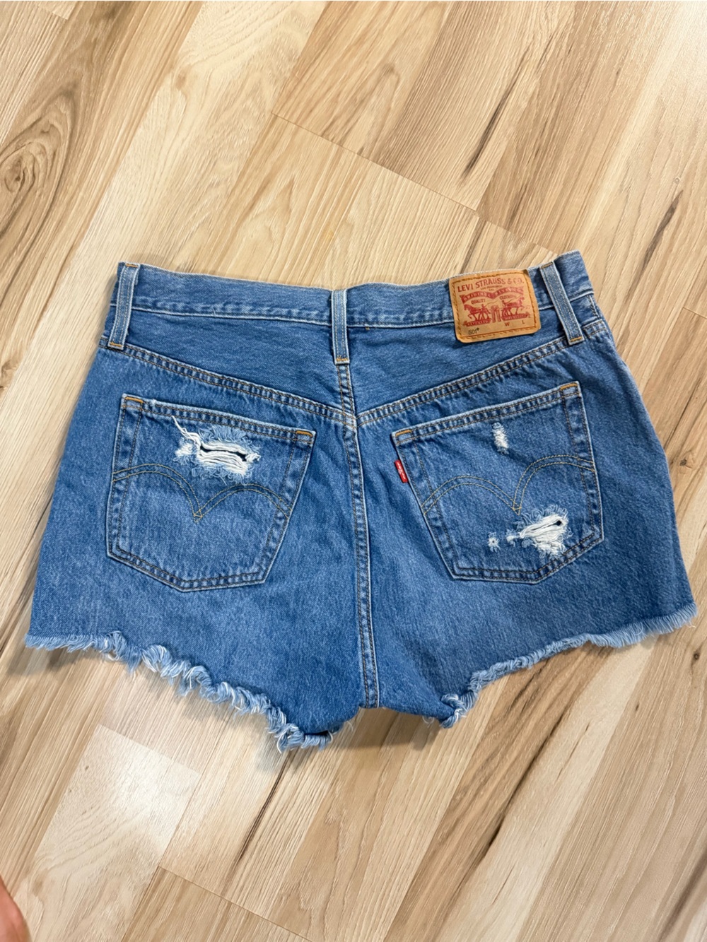 Levi’s 501 Medium Wash Distressed Denim Shorts